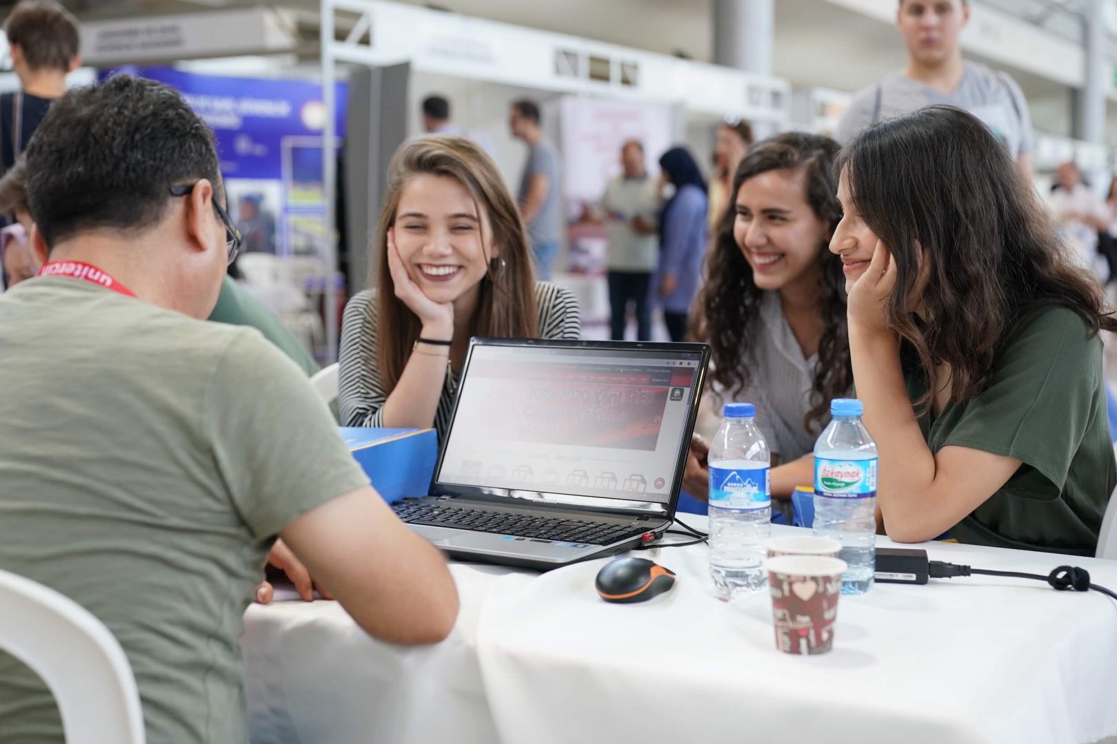 Students checking university stands